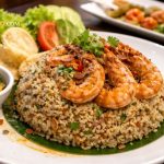 Nasi goreng kampung premium dengan udang besar dan plating elegan ala hotel bintang 5, tampilan mewah dan menggugah selera