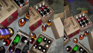 Santri melakukan razia dan pemusnahan minuman keras di gudang penyimpanan miras wilayah Kabupaten Ciamis pada malam hari.
